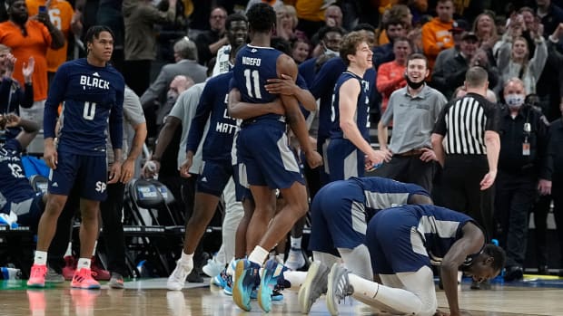 Saint Peter’s players celebrate after defeating Murray State in a college basketball game in the second round of the NCAA tournament, Saturday, March 19, 2022, in Indianapolis.